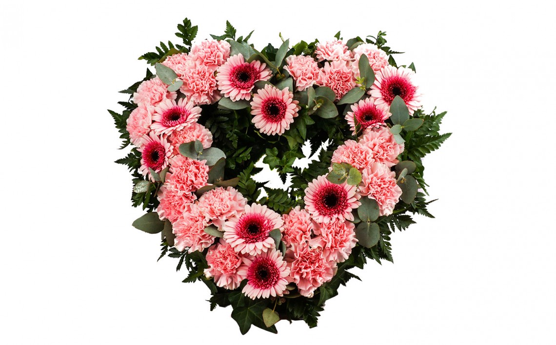 Hjärtkrans i rosa - en liten begravningsdekoration för leverans i Uppsala